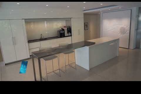 Image of Reservoir café area with a long table and two chairs